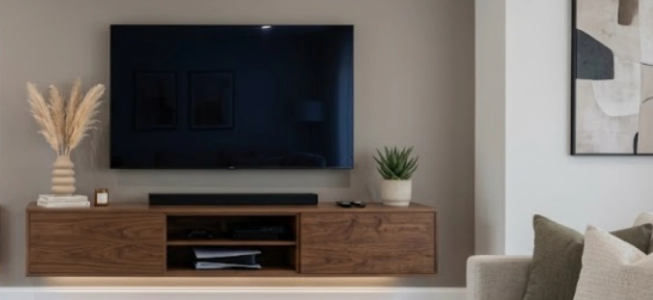 Floating low-profile media console with undermount lighting kept clear of the floor