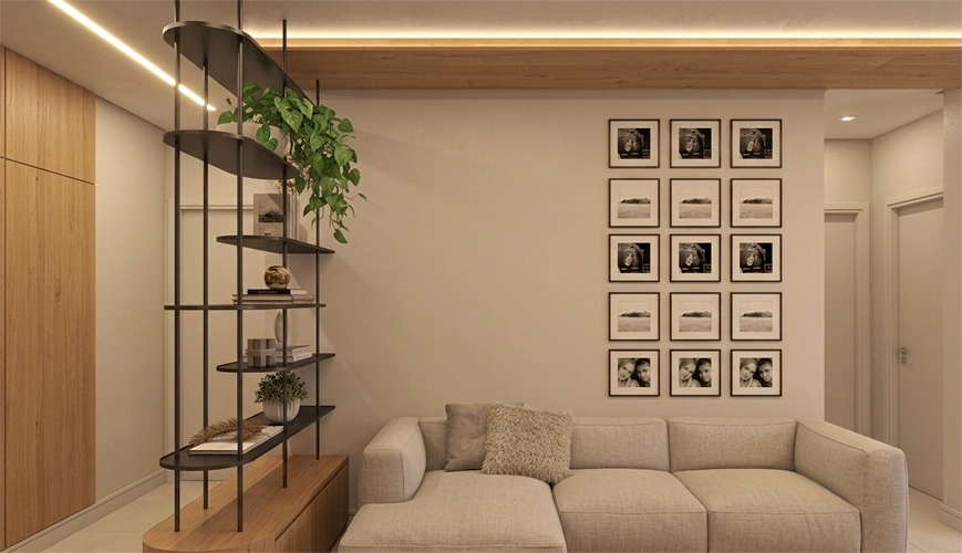 Modern partition wall with a central sintered stone panel flanked by laser-cut brass jaali screens